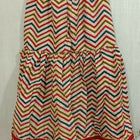 Elevate your baby girl's style with the captivating combination of red and skin color - a perfect blend of vibrancy and warmth for her adorable wardrobe