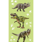 Three toy dinosaurs on a green background 