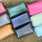 Collection of colorful leather pouches 