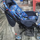 BABYHUG Cosy Cosmo Stroller/Pram with a lightweight foldable frame, reclining seat, adjustable canopy, 5-point safety harness, smooth wheels, and spacious storage basket for comfortable everyday travel with babies and toddlers.