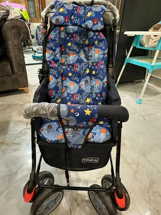 Discover the BABYHUG Cosy Cosmo Reversible Handle and Back Pocket Stroller/Pram in Navy Blue, offering versatility, comfort, and safety for your baby with a reversible handle, spacious back pocket, and smooth ride suspension system.