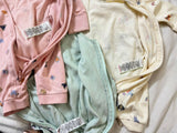 Buy NEXT Baby Sleep Suits – Pack of 3 super soft cotton onesies with 2-way zippers and built-in mitts for all-night comfort.

