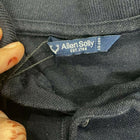 Close-up of a label on a dark-colored garment with 'Allen Solly' branding.