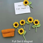Set of sunflower-shaped magnets with a small orange basket 