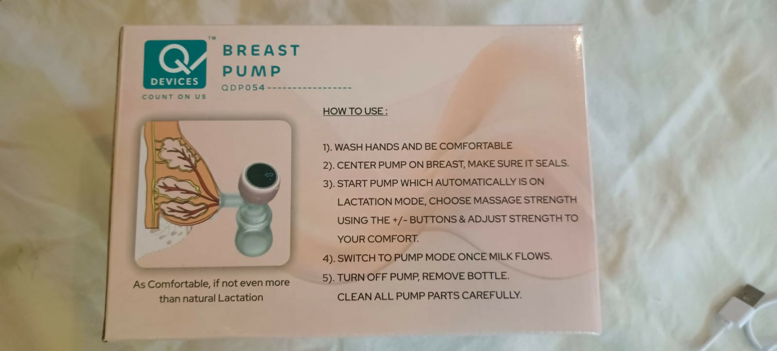 Q Devices Breast Pump QD P054 – Portable, Quiet, and Efficient Pumping Solution for Nursing Mothers.