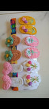 Cute and colorful hair clips for baby girls, offering gentle, secure styling for delicate hair.