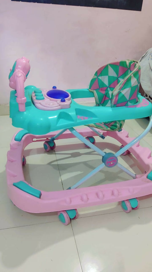 Support your baby's first steps with the TUK TUK Baby Walker – featuring a sturdy frame, padded seat, adjustable height, and interactive toy tray for a fun and safe walking experience.