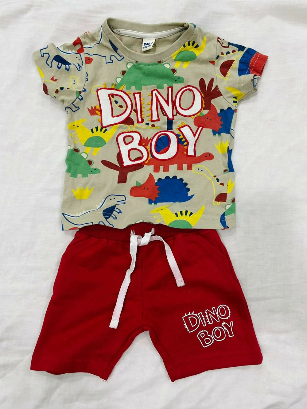 Let your baby roar in style with the Dino Boy Colorful Baby Dress Set—fun, comfy, and perfect for any adventure!
