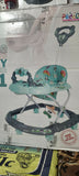 Baby walker with colorful design on a box in the background