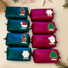Set of Christmas-themed makeup bags with festive designs 