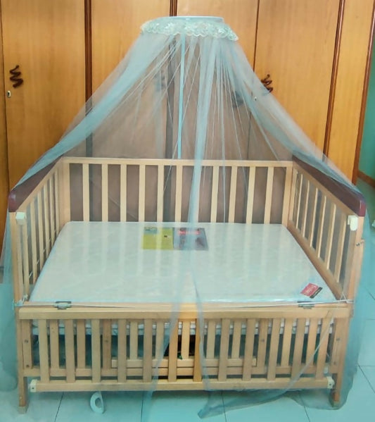 Discover the BABYHUG Hamilton Wooden Cot/Crib with Mosquito Net and BABYHUG Mattress, providing a safe, comfortable, and insect-free sleeping environment for your baby.