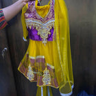 Dress your little one in this vibrant Yellow and Purple Traditional Chaniya Choli for a stunning, festive look!






