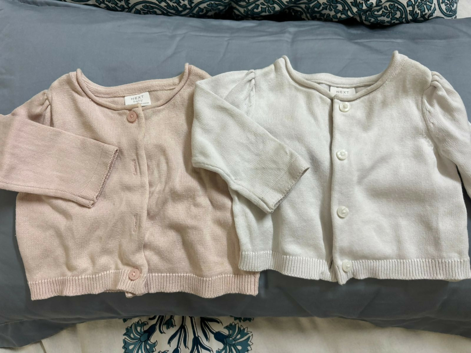 Keep your baby stylish and comfortable with this set of 2 soft, ribbed cardigans from NEXT. 