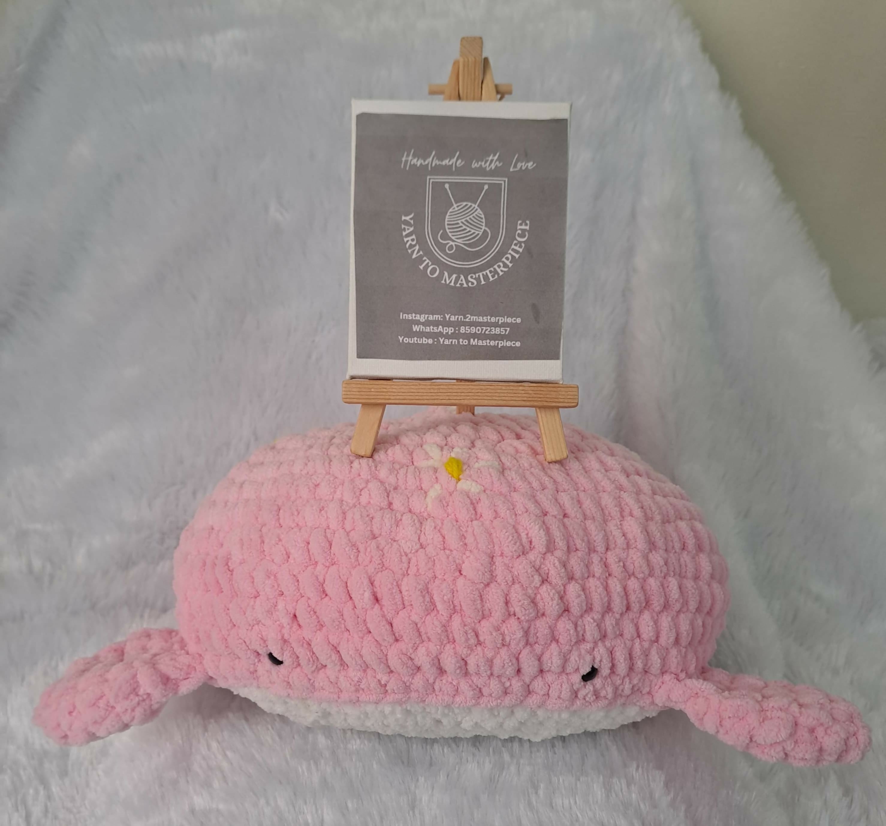 Bring charm and comfort to your child's space with the 12" Diameter Crochet Whale Plushie Pillow – handcrafted with soft, high-quality yarn for cuddling and decorative purposes. Perfect for snuggling and as a delightful room accessory.