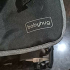 Black baby bag with 'babyhug' logo on a dark surface