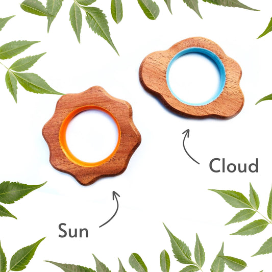 Bring sunshine and comfort to your baby's teething with Babycov's Cute Cloud and Sun Neem Wood Teethers - organic goodness for safe and playful chewing!