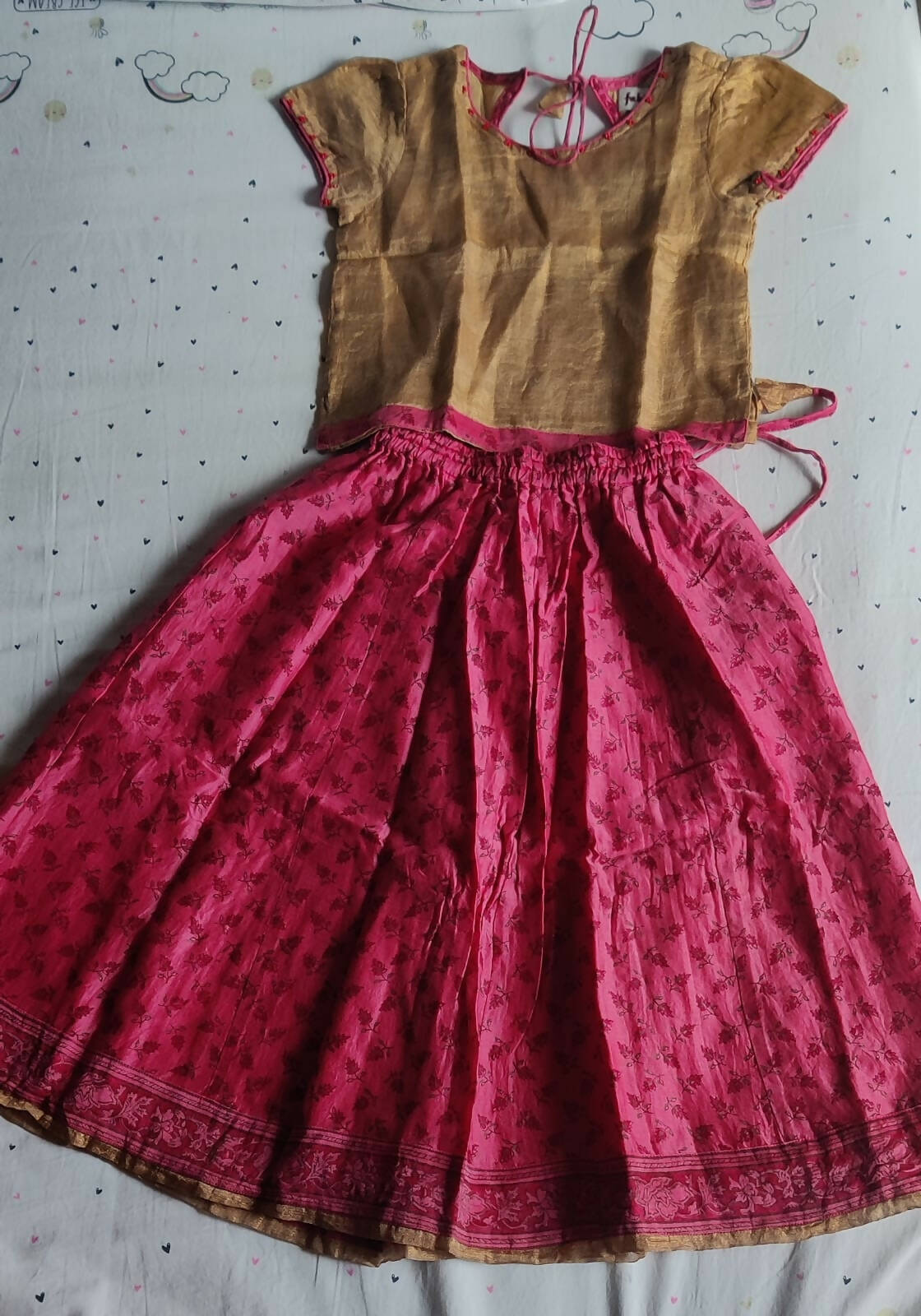 Dress your baby girl in style with the FAB INDIA Top and Lehenga—an ensemble that captures the essence of Indian tradition while offering comfort and sophistication for your little princess.