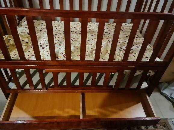 Create a safe and cozy haven for your little one with our Cot/Crib - where sweet dreams begin!